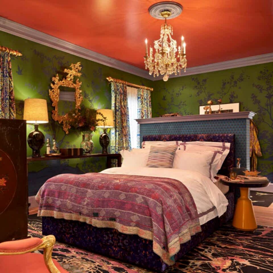 The Vase Occasional Table by DAVIDSON London sits in this principal bedroom and is finished with a warm yellow gloss lacquer base and deep blue gloss lacquer top. Beautifully styled by Rayman Boozer as part of WOW!House