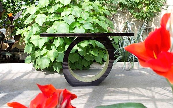 A luxury console table perfect for spring being used outdoors.